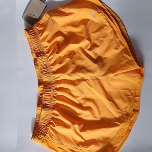 NIKE dri fit womens tempo running shorts size 2XL yellow